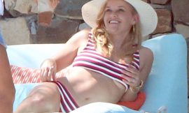 Reese Witherspoon Flashes Underboobs While Tanning In Bikini