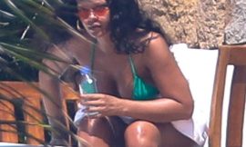 Rihanna Sunbathing In A Sexy Green Bikini