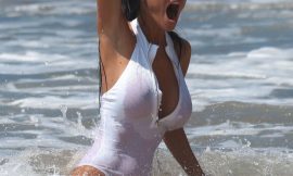 Charlie Riina Shows Off Her Massive Breasts In Transparent Swimsuit