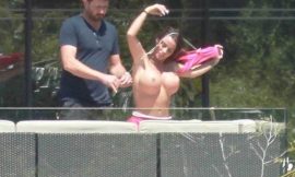 Katie Price Caught Sunbathing Topless