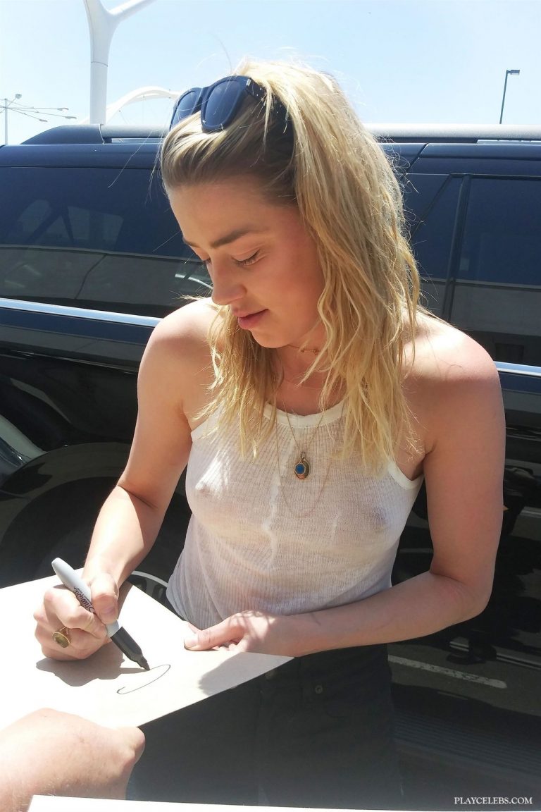 Read more about the article Amber Heard Paparazzi See Through Nipples Shots