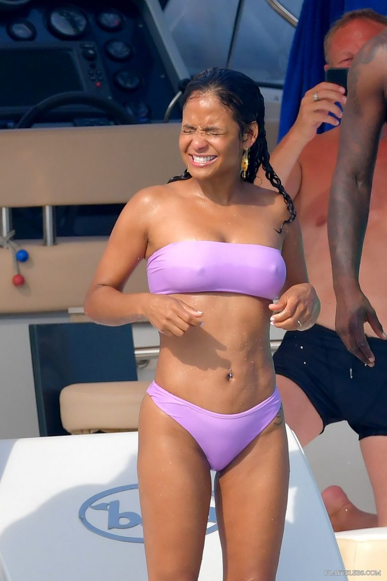 Read more about the article Christina Milian Flashing Her Boobs And Cameltoe In Wet Bikini