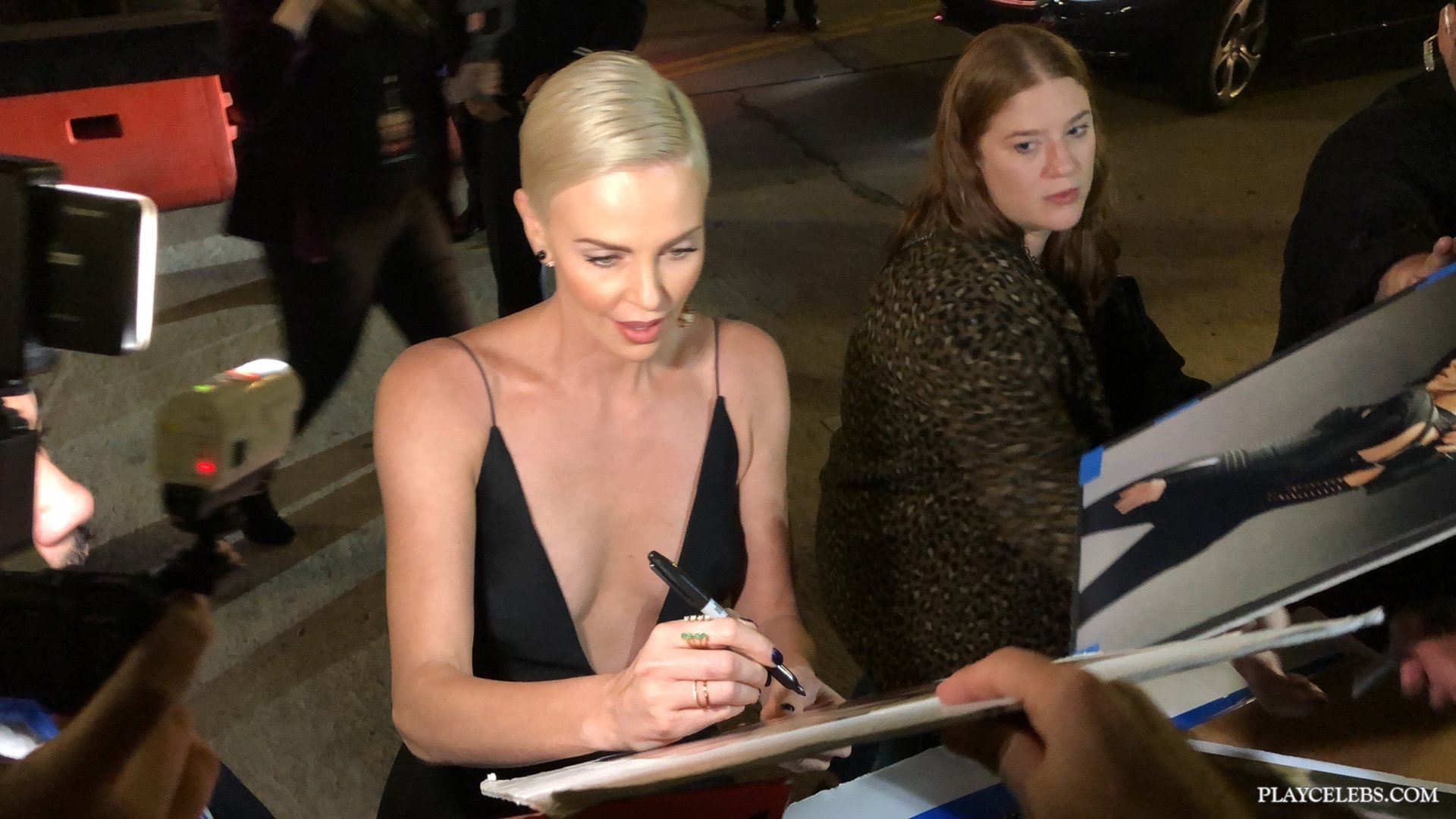 Hollywood Star Charlize Theron Amazing Cleavage And Sexy