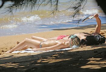 Margot Robbie topless beach pics